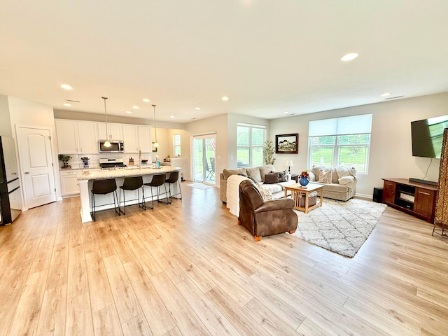 3895 Brody Dr, Grove City, OH 43123 - living area featuring light wood-style floors and recessed lighting