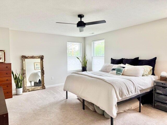 3895 Brody Dr, Grove City, OH 43123 - bedroom with light carpet, baseboards, and ceiling fan