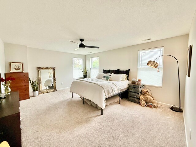 3895 Brody Dr, Grove City, OH 43123 - bedroom featuring carpet, a ceiling fan, baseboards, and a textured ceiling