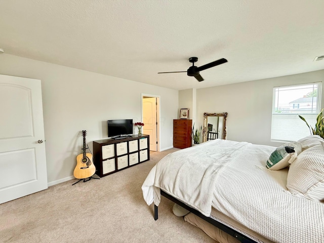 3895 Brody Dr, Grove City, OH 43123 - bedroom with light carpet, ceiling fan, and baseboards