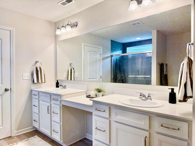 3895 Brody Dr, Grove City, OH 43123 - full bath featuring vanity, a stall shower, and wood finished floors