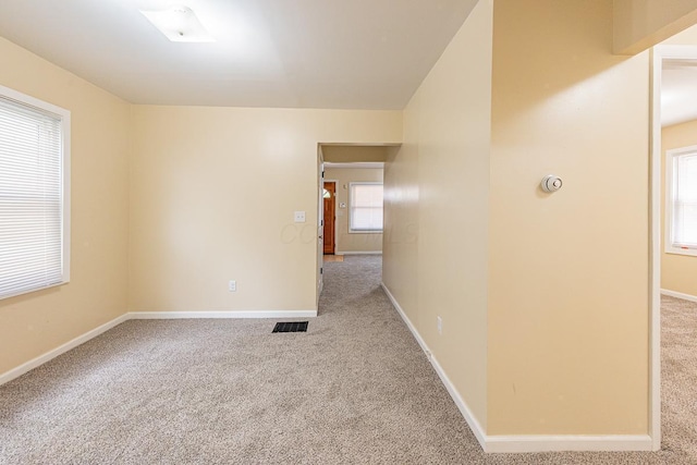 1121 Oakwood Ave, Columbus, OH 43206 - carpeted spare room with baseboards