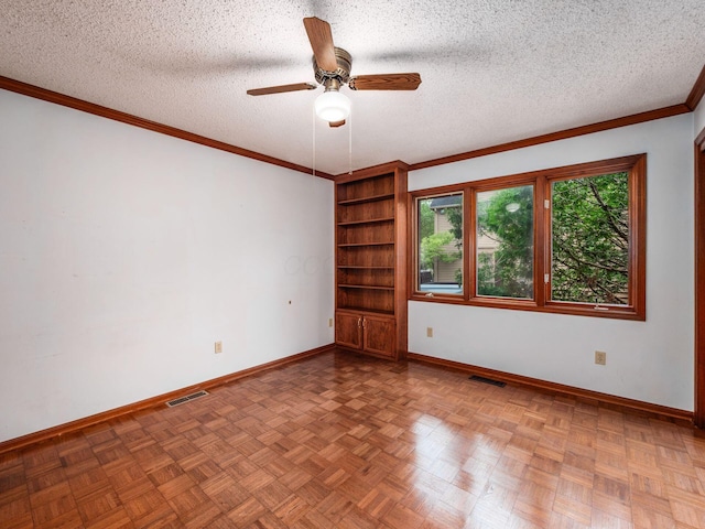 5434 Flat Head Ct, Columbus, OH 43230 - empty room with baseboards, ceiling fan, crown molding, a textured ceiling, and built in features