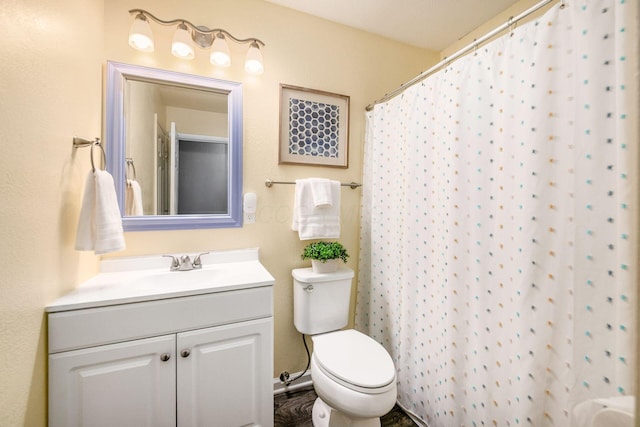 1058 Erickson Ave, Columbus, OH 43227 - bathroom with toilet, vanity, and a shower with curtain