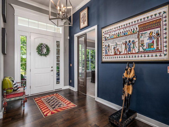 2235 Forestview Ln, Delaware, OH 43015 - entryway featuring a chandelier, crown molding, and wood finished floors