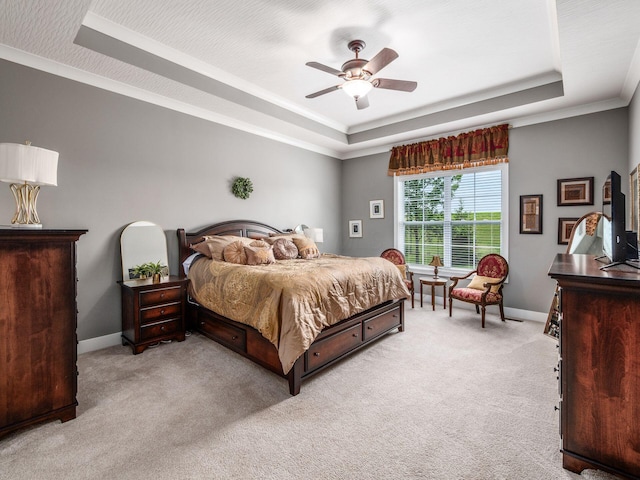 2235 Forestview Ln, Delaware, OH 43015 - bedroom with a raised ceiling, light colored carpet, crown molding, and a ceiling fan