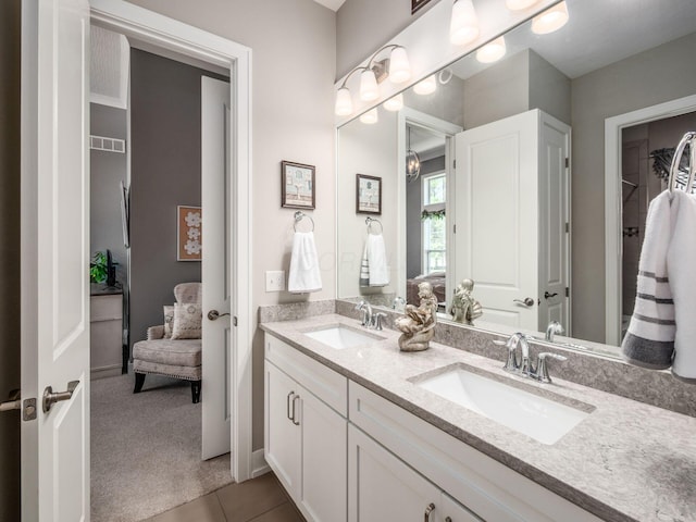 2235 Forestview Ln, Delaware, OH 43015 - full bathroom featuring double vanity and tile patterned flooring
