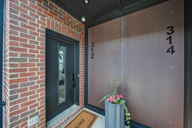312 Cornelius St, Columbus, OH 43215 - entrance to property with brick siding