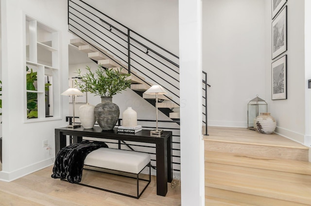 312 Cornelius St, Columbus, OH 43215 - stairway featuring wood finished floors and baseboards