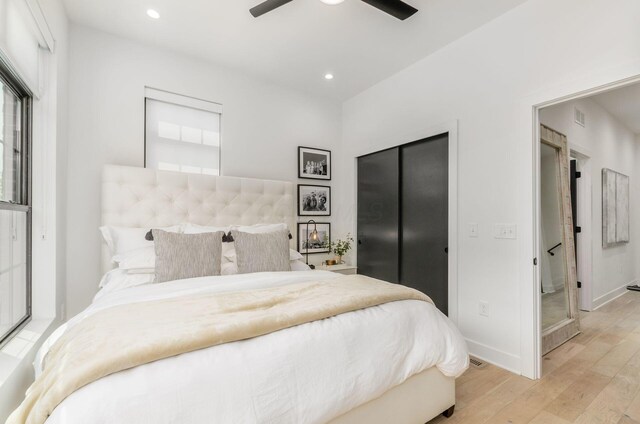 312 Cornelius St, Columbus, OH 43215 - bedroom with light wood-style flooring, recessed lighting, and ceiling fan