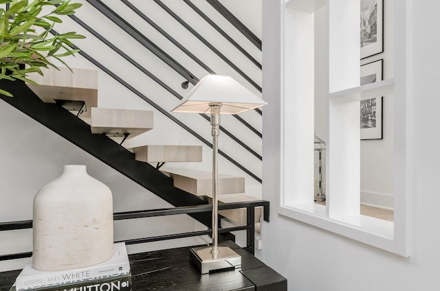 312 Cornelius St, Columbus, OH 43215 - stairway featuring wood finished floors