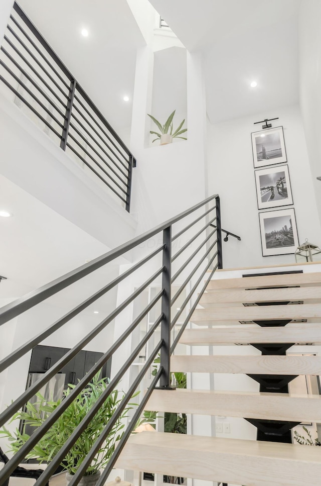 312 Cornelius St, Columbus, OH 43215 - staircase featuring recessed lighting