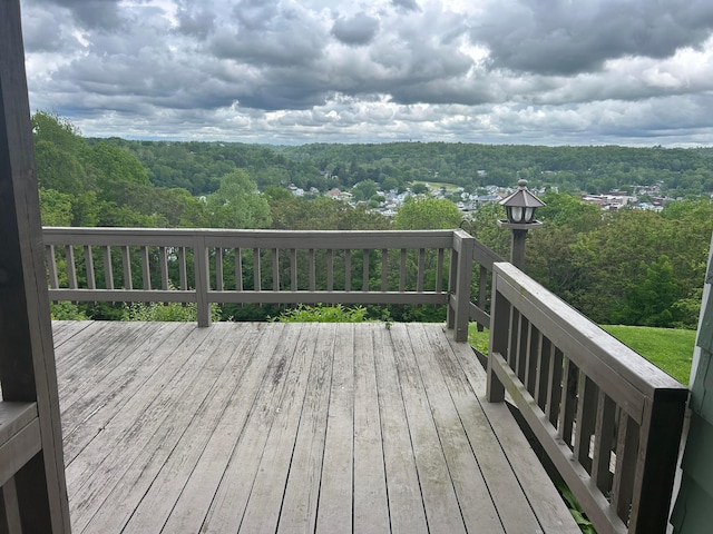 3049 Palace Heights Ln NW, Malta, OH 43758 - wooden terrace featuring a forest view
