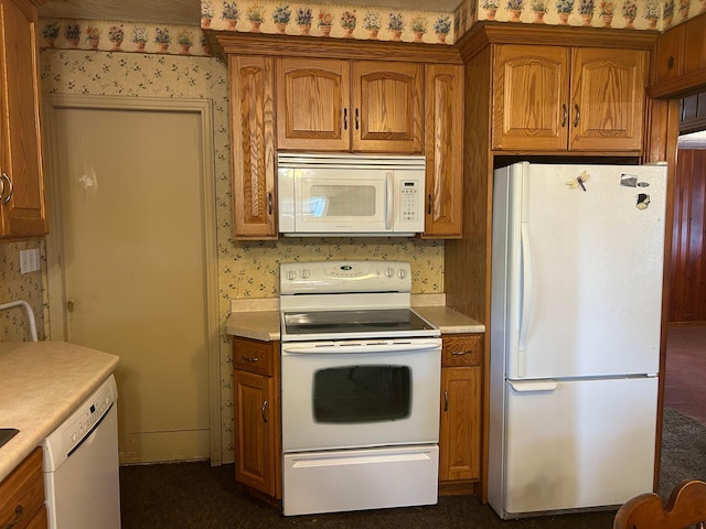 3049 Palace Heights Ln NW, Malta, OH 43758 - kitchen featuring white appliances, wallpapered walls, brown cabinetry, and light countertops