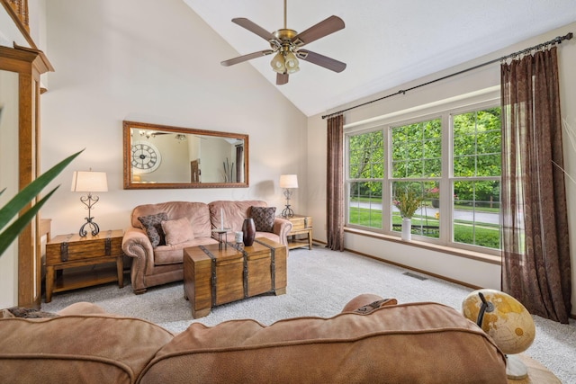 388 Slate Run Dr, Powell, OH 43065 - carpeted living room with high vaulted ceiling, ceiling fan, and baseboards