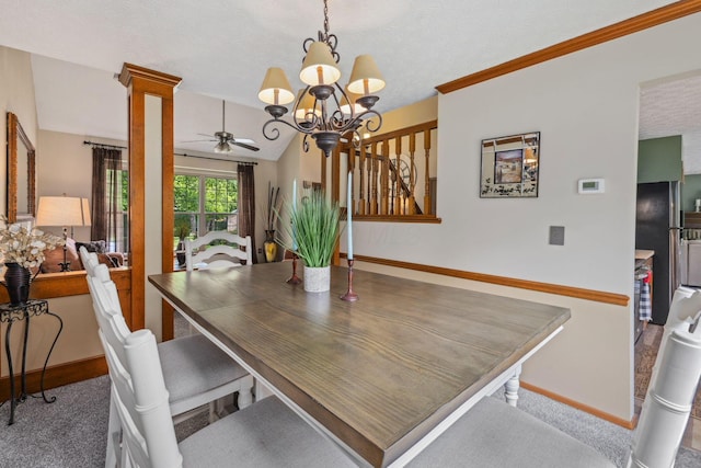 388 Slate Run Dr, Powell, OH 43065 - dining area featuring baseboards, ceiling fan, a chandelier, and ornate columns