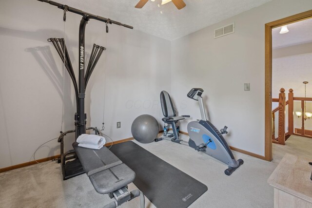 388 Slate Run Dr, Powell, OH 43065 - exercise area with baseboards, ceiling fan, carpet, and a textured ceiling