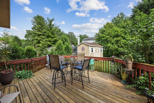 388 Slate Run Dr, Powell, OH 43065 - wooden deck featuring outdoor dining area