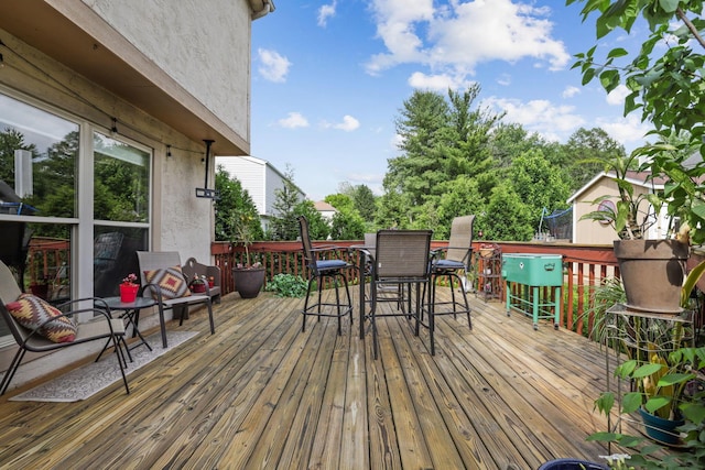 388 Slate Run Dr, Powell, OH 43065 - wooden terrace featuring outdoor dining area