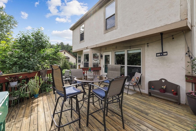 388 Slate Run Dr, Powell, OH 43065 - wooden terrace featuring outdoor dining area