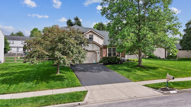 388 Slate Run Dr, Powell, OH 43065 - view of front of property with asphalt driveway and an attached garage