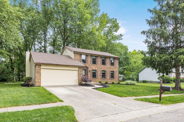 544 Waring Way, Columbus, OH 43213 - colonial-style house featuring an attached garage, brick siding, a front lawn, concrete driveway, and a chimney