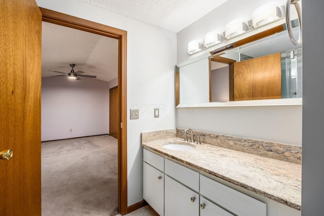 544 Waring Way, Columbus, OH 43213 - bathroom with vanity, a ceiling fan, and a textured ceiling