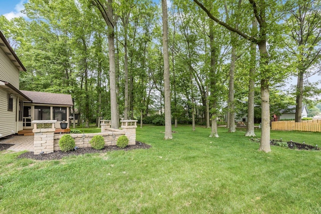 544 Waring Way, Columbus, OH 43213 - view of yard with a sunroom and view of scattered trees