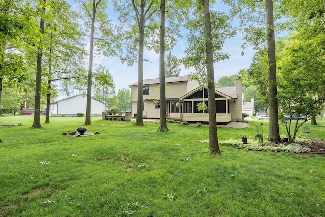 544 Waring Way, Columbus, OH 43213 - view of green lawn with a sunroom