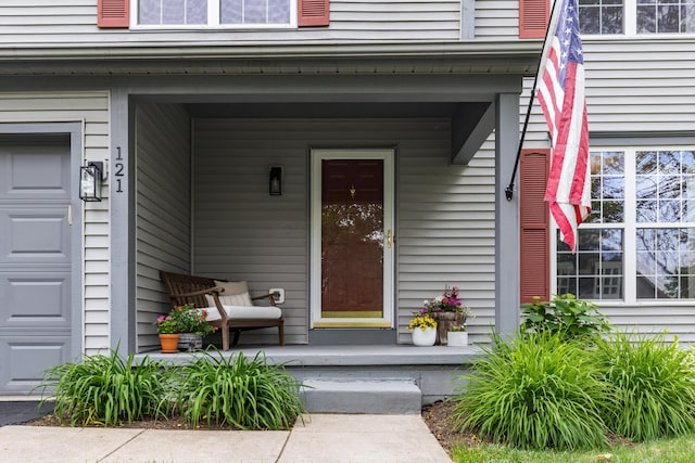 121 Persimmon Ct, Delaware, OH 43015 - doorway to property featuring a porch