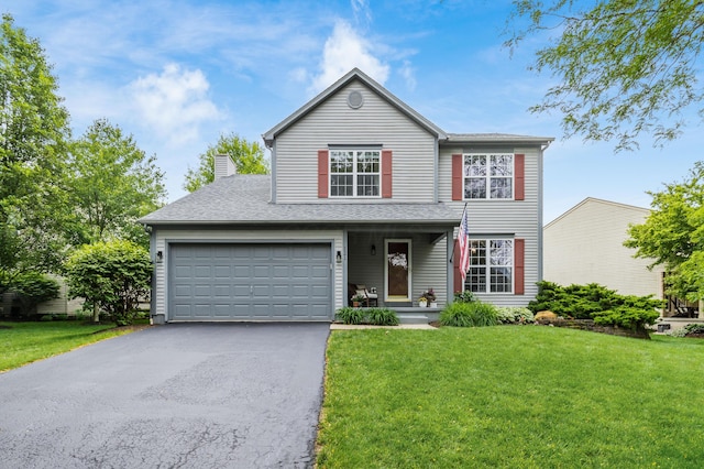 121 Persimmon Ct, Delaware, OH 43015 - traditional-style home featuring driveway, a front yard, an attached garage, a chimney, and roof with shingles