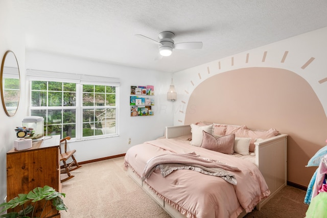 121 Persimmon Ct, Delaware, OH 43015 - bedroom with carpet, baseboards, ceiling fan, and a textured ceiling