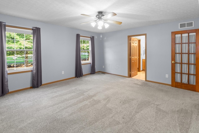 3040 Seney Rd Unit 912, Chillicothe, OH 45601 - carpeted empty room with a ceiling fan, baseboards, and a textured ceiling