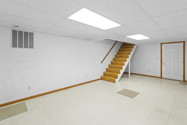 3040 Seney Rd Unit 912, Chillicothe, OH 45601 - finished basement featuring a drop ceiling, stairs, baseboards, and tile patterned floors