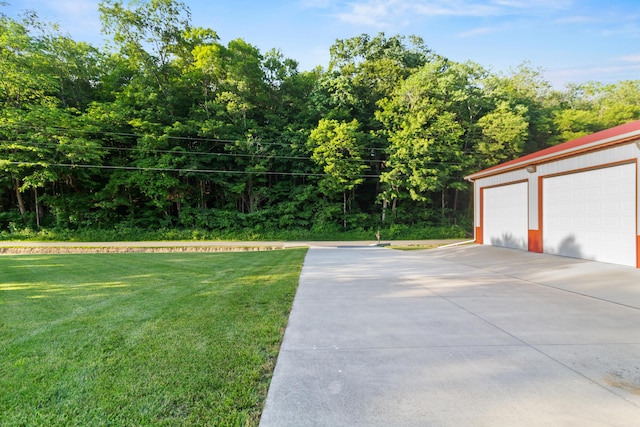 3040 Seney Rd Unit 912, Chillicothe, OH 45601 - view of grassy yard with a detached garage