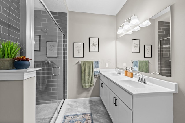 206 Rochdale Run, Delaware, OH 43015 - bathroom with marble look tile flooring, double vanity, a stall shower, and baseboards