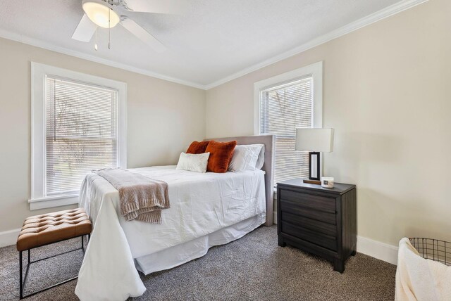 2509 Perdue Ave, Columbus, OH 43211 - carpeted bedroom with crown molding, baseboards, and a ceiling fan