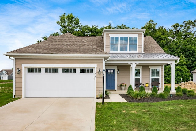 3446 Joberry Loop, Grove City, OH 43123 - view of front of house with a porch, concrete driveway, a shingled roof, an attached garage, and a front lawn