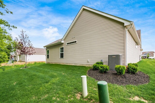 3446 Joberry Loop, Grove City, OH 43123 - view of side of property featuring a lawn and central air condition unit