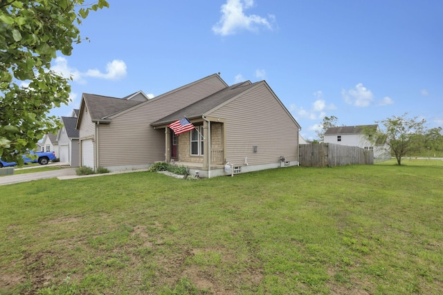 982 Margate Cir, London, OH 43140 - view of property exterior with an attached garage and concrete driveway