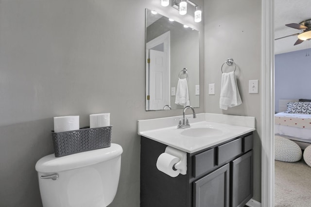 982 Margate Cir, London, OH 43140 - ensuite bathroom with toilet, vanity, and a ceiling fan