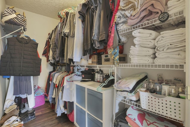 982 Margate Cir, London, OH 43140 - spacious closet with dark wood-style flooring