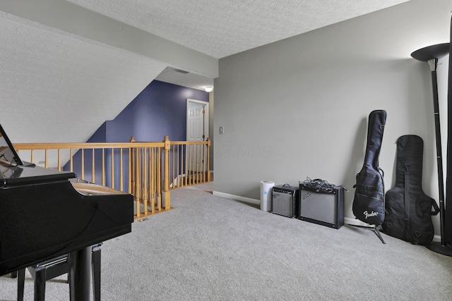 982 Margate Cir, London, OH 43140 - living area with a textured ceiling, carpet floors, baseboards, and an upstairs landing