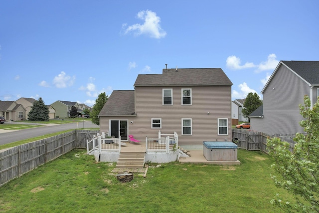 982 Margate Cir, London, OH 43140 - rear view of house with a hot tub, a deck, a residential view, and roof with shingles
