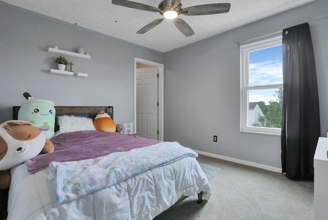 982 Margate Cir, London, OH 43140 - bedroom with multiple windows, carpet, baseboards, and a ceiling fan