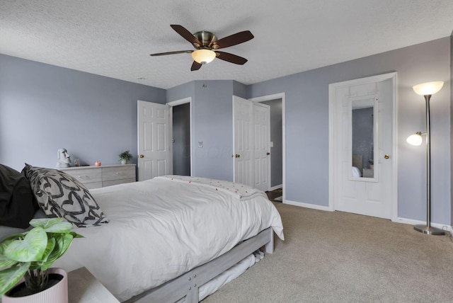 982 Margate Cir, London, OH 43140 - bedroom with carpet, baseboards, and a ceiling fan
