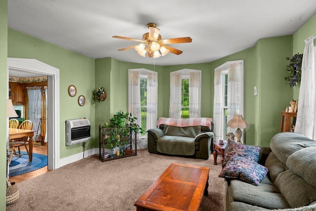 841 Township Highway 52, Nevada, OH 44849 - carpeted living area with heating unit, ceiling fan, and baseboards