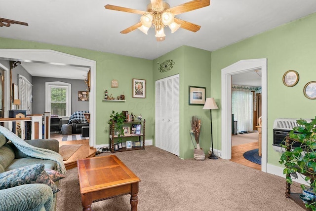 841 Township Highway 52, Nevada, OH 44849 - living area with a ceiling fan, heating unit, carpet flooring, and baseboards