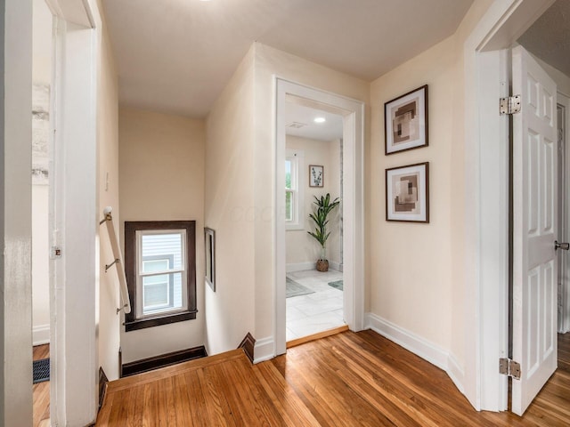 1156 S Champion Ave, Columbus, OH 43206 - hallway featuring wood finished floors and a baseboard radiator