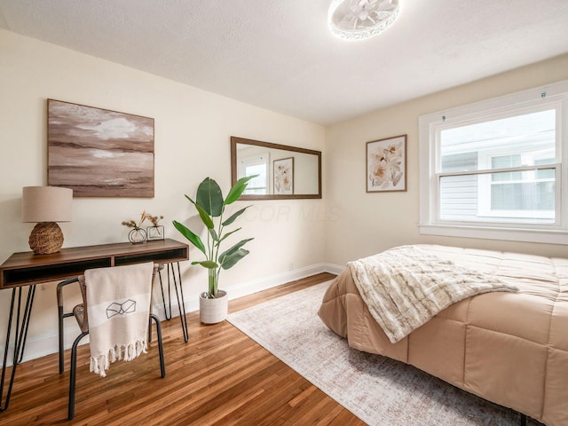 1156 S Champion Ave, Columbus, OH 43206 - bedroom with wood finished floors and baseboards